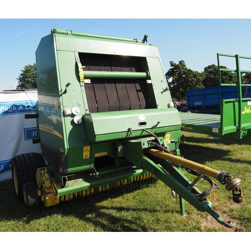 1301 - 2005 John Deere 582 Hiflow round baler. Off farm, very tidy