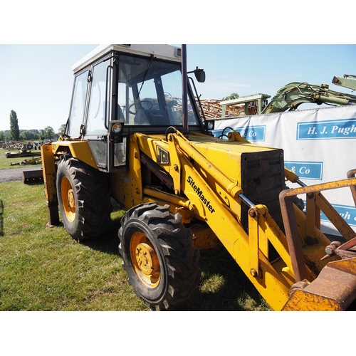 1309 - JCB 3CX Sitemaster digger with buckets. 6198 hours recorded. Runs and drives. Reg. G881 GBO. Key in ... 