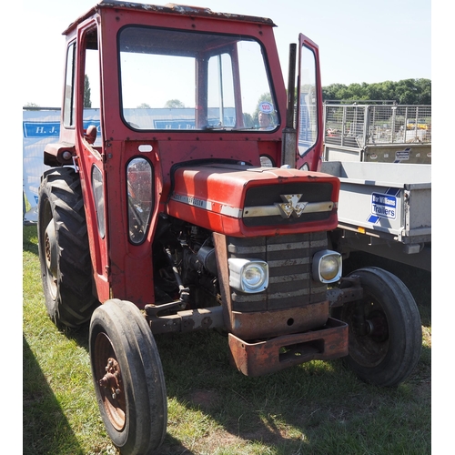 1313 - Massey Ferguson 135 tractor. 6462 hours recorded. Runs and drives well. Sirocco cab. No documents. R... 