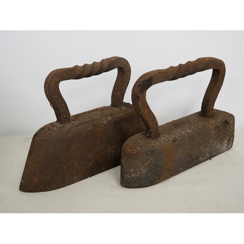 499 - 2 Old steel irons