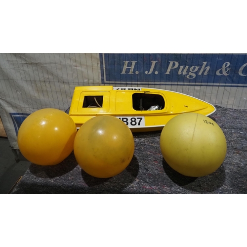 448 - Vintage powerboat and globes