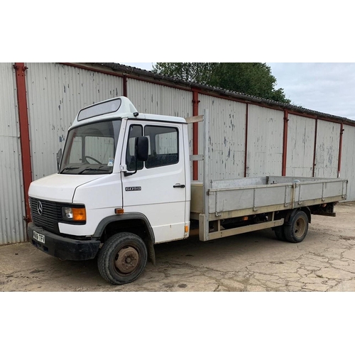 101 - Mercedes 609D lorry with 15ft aluminium drop side bed, showing 316,231 kms. Reg. M849 TFV