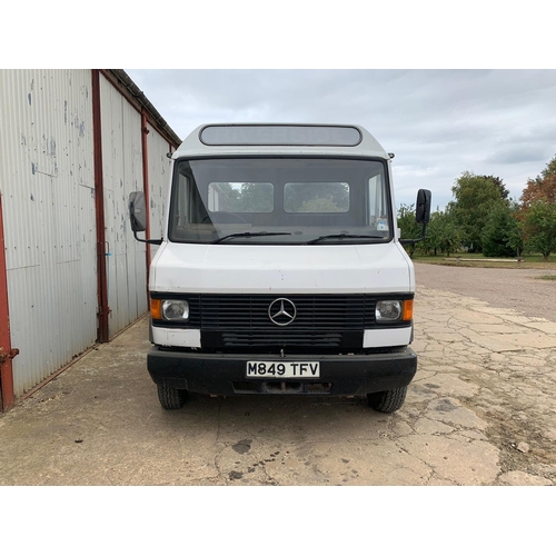 101 - Mercedes 609D lorry with 15ft aluminium drop side bed, showing 316,231 kms. Reg. M849 TFV