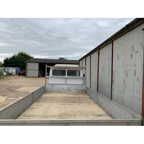 101 - Mercedes 609D lorry with 15ft aluminium drop side bed, showing 316,231 kms. Reg. M849 TFV