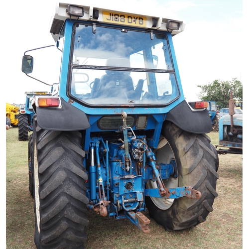 412 - Ford 7610 4WD tractor. III Series. c/w Quicke 4060 Loader. Good front tyres, 7311 hours recorded. Ru... 