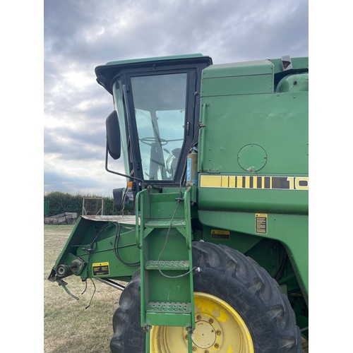 184 - John Deere 1055 combine. c/w 12ft header and trolley. Used this season. Reg J58 GPX. V5