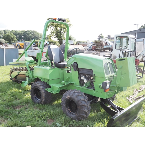 1973 - Vermeer wheeled trencher with blade and road cutting attachment and spare chain. refurbished, good w... 