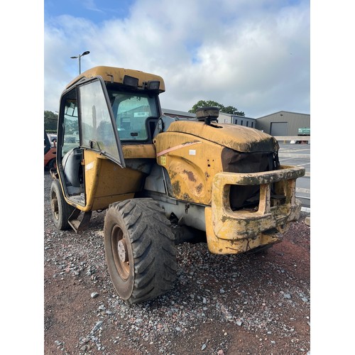 2120D - New Holland LM630 telehandler, showing 10,973 hours