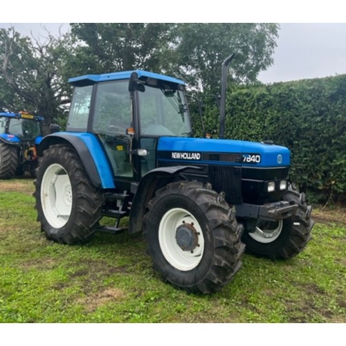 447 - New Holland 7840 tractor. 8501 hours showing.  Runs. Reg N787EWC. V5.