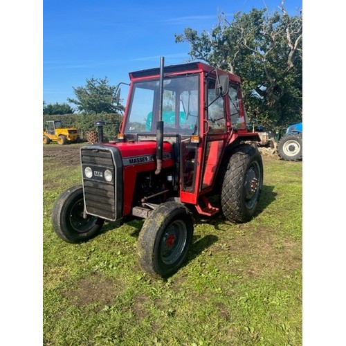 449 - Massey Ferguson 250 tractor with cab. Runs. On rear grass tyres. 5591 hours showing. Reg KYB 495Y