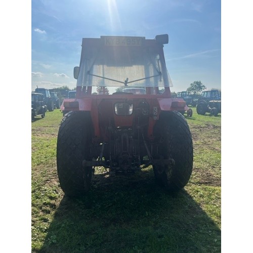 449 - Massey Ferguson 250 tractor with cab. Runs. On rear grass tyres. 5591 hours showing. Reg KYB 495Y