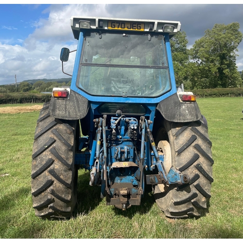 124 - Ford TW-15 generation two tractor. Runs & drives well, showing 6185 hours but clock is not currently... 