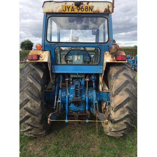 323 - Ford 7000 tractor. 1975. With Fieco cab. Runs and drives. Owned by the same owner since 1990 in Glou... 
