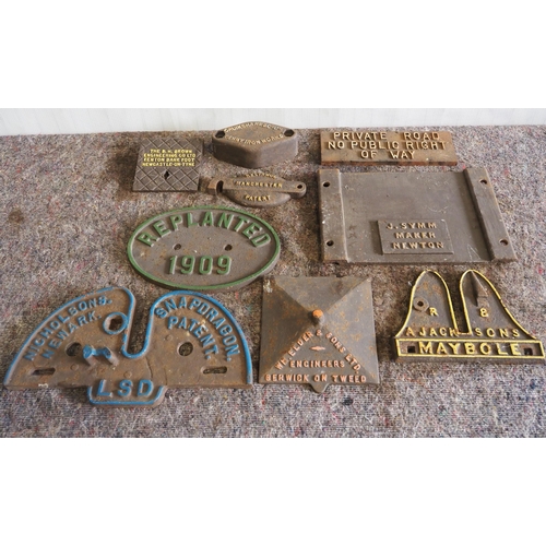 36 - 9- Cast iron name plates and signs to include Nicholsons