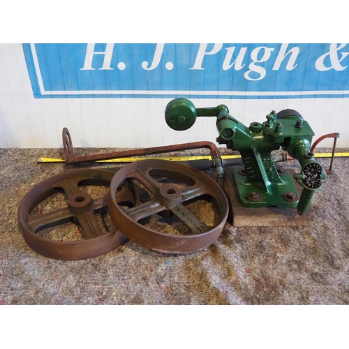 103 - Stirrup pump, sheep shearer & trolley wheels