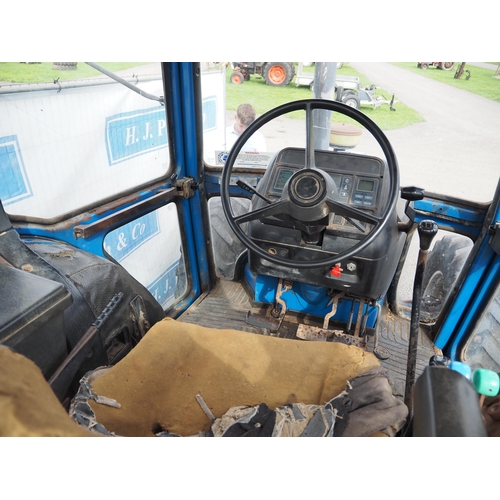 794 - Ford 7610 series 3 tractor. Runs & drives. Fitted with front weights, single assistor ram & pick up ... 