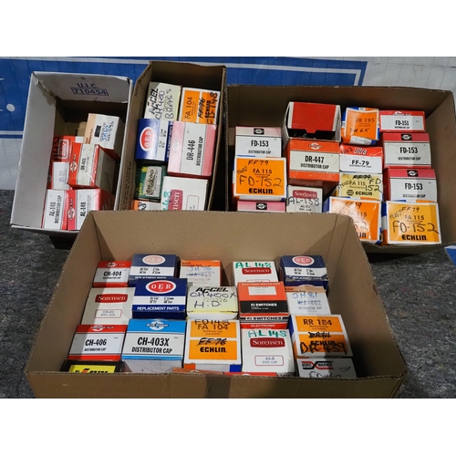 123 - 4 Boxes of assorted American car distributor caps