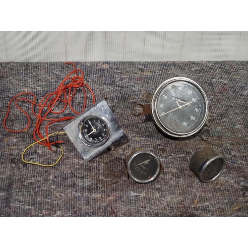 134 - 1940s and 1960s Car speedos, petrol gauges and Smith clock