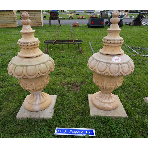 487 - Pair of ornate stone pillar caps