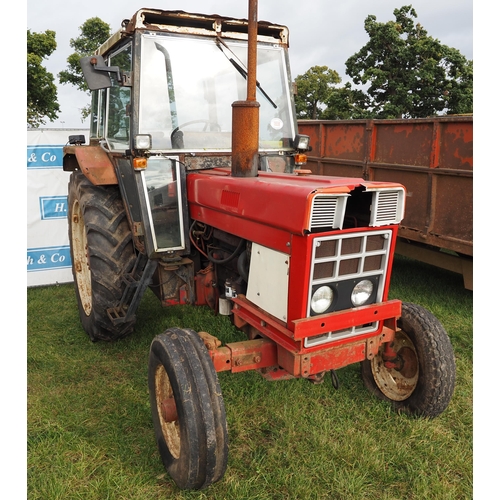 1659 - IH 784 tractor, showing 4689 hours, runs and drives, NRU 277W. Key in office. V5