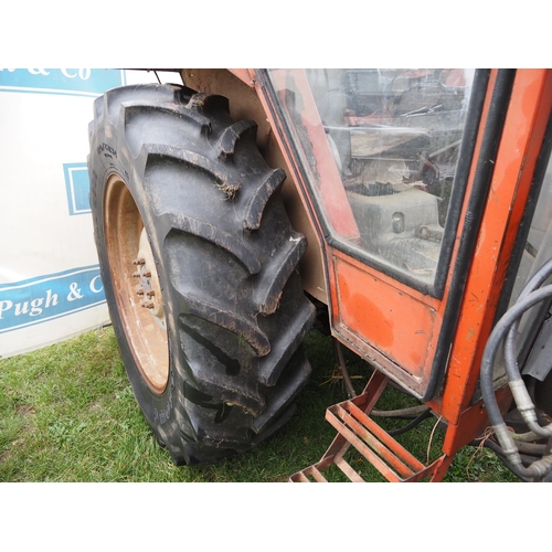 1768 - Massey Ferguson 290 4WD tractor. Showing 7470 hours. Runs and drives. Massey Ferguson loader, bucket... 