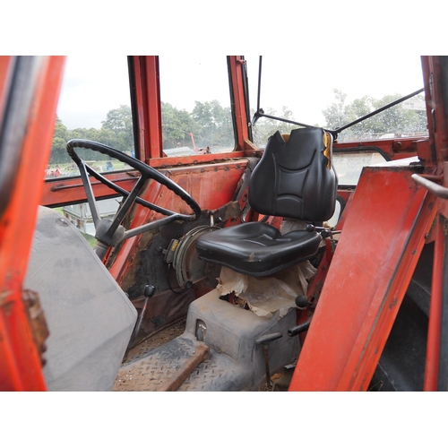 1768 - Massey Ferguson 290 4WD tractor. Showing 7470 hours. Runs and drives. Massey Ferguson loader, bucket... 