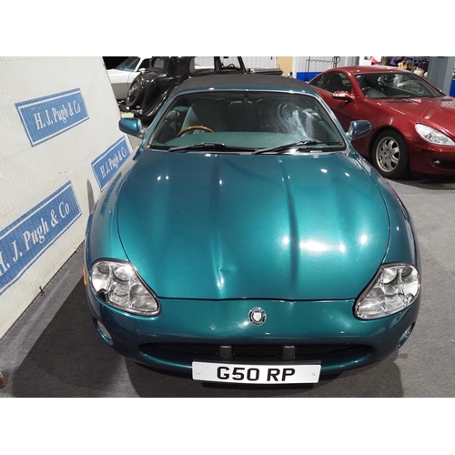 331 - Jaguar XK8 V8 auto convertible car, 3996cc, 1998. Drove to Saleroom. Number plate on the car is not ... 