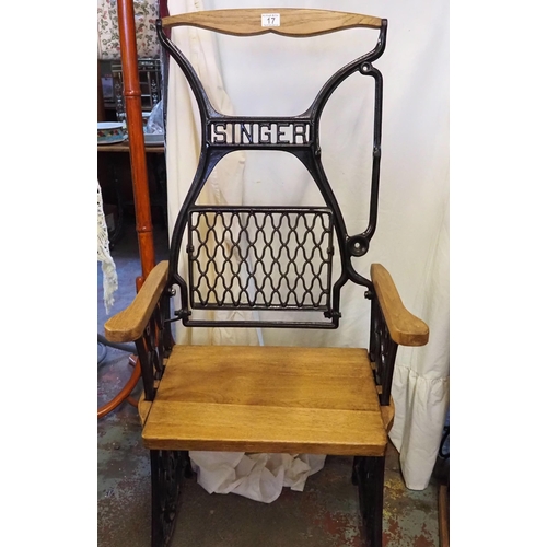 17 - Cast iron and oak Singer armchair