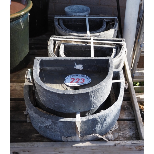 223 - Quantity of rustic style D shaped troughs