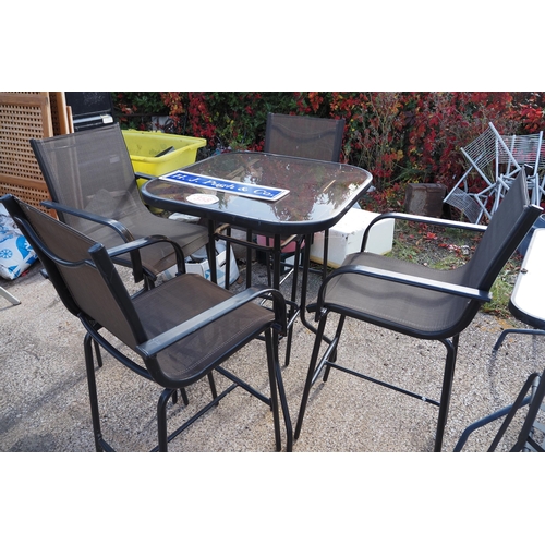 358 - 4 Metal stools and matching glass top table