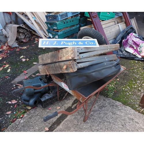 374 - Wheelbarrow, drainage parts and trestles etc.