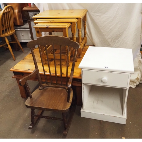 63 - Hardwood coffee table, pine nest of 3 tables, childs rocking chair and bedside cabinet