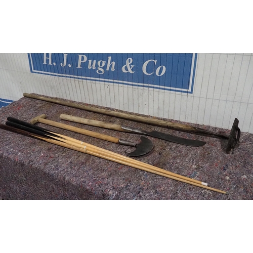 335 - Hoe, lawn edger, Elwell knife and pool cues