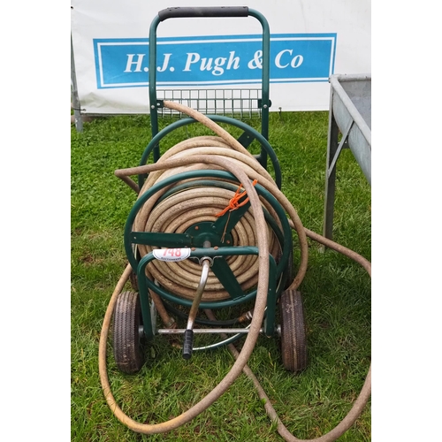 748 - Garden hose pipe and reel