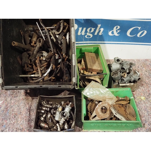 719 - Carburetor parts, foot pegs and assorted motorcycle autojumble