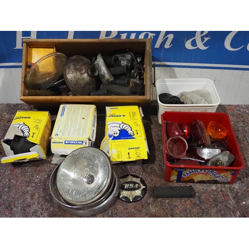 730 - Assorted motorcycle autojumble to include light lenses, headlight parts, foot peg rubbers etc.