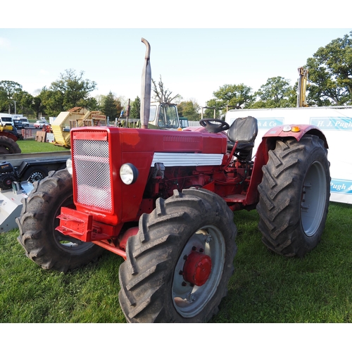 1397 - International 824 4x4 Tractor. Runs and drives. Keys in office