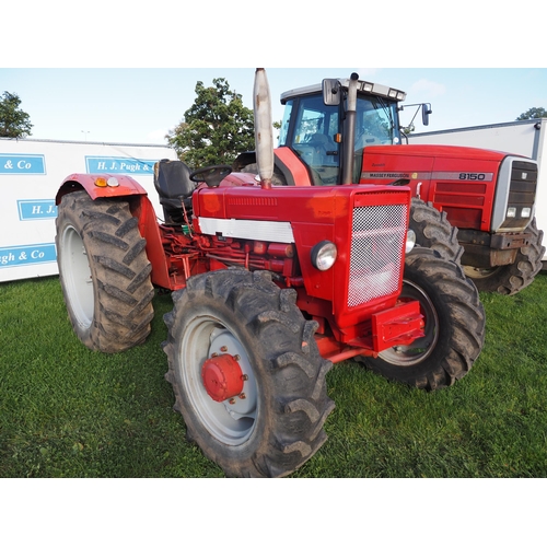 1397 - International 824 4x4 Tractor. Runs and drives. Keys in office