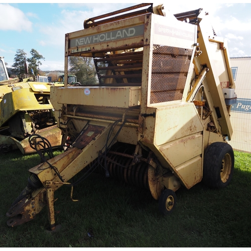 1441 - New Holland 841 round baler. PTO and electric box in office