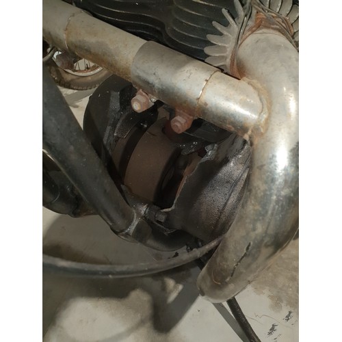 828 - BSA A50 motorcycle. Damage to front of engine/gearbox. Frame no. A65.19769. C/w Nova docs