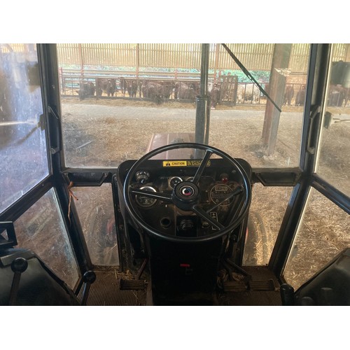 124B - International 724 tractor. 1980. Deluxe cab. C/w loader. 6318 hours recorded. Key in office. V5