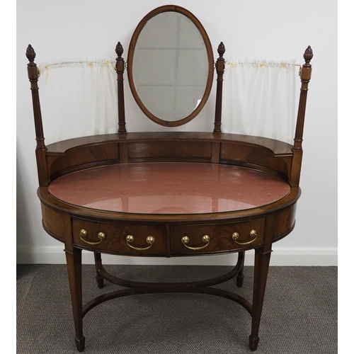 76 - Mahogany oval dressing table with glass top, mirror and curtains 48
