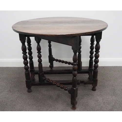 81 - Early oak gateleg table with turned legs 28½