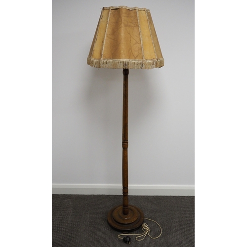 75 - Early oak turned standard lamp with part leather shade 70