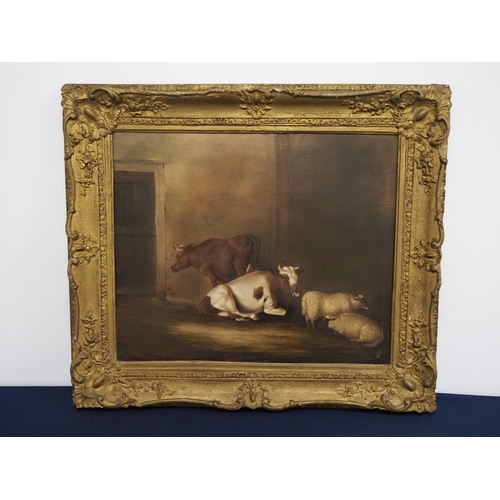 92 - Oil on canvas - barn scene with cattle and sheep, in gilt frame 18½