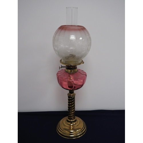 122 - Oil lamp complete with globe and chimney