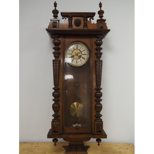 87 - Wall clock in wood and glass case 48