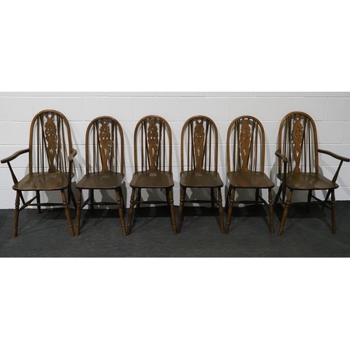 67 - Set of 6 modern beech wheelback chairs, to include 2 carvers