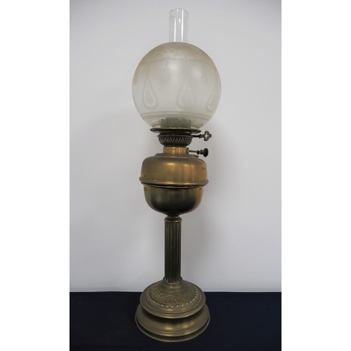 125 - Original Victorian brass oil lamp complete with globe and chimney