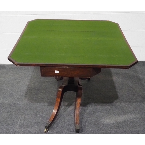 154 - Victorian mahogany swivel top folding games table with inlay, pedestal base and on brass casters 36